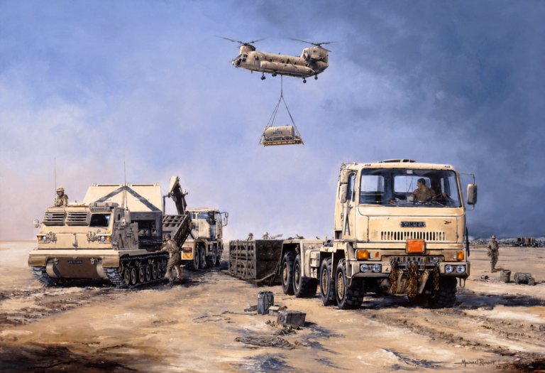 Military CH-47 Chinook helicopter hoisting a cargo pallet over a desert airfield with armored vehicles and trucks.