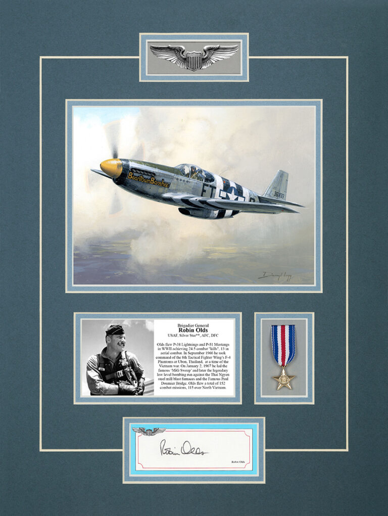 Photograph and signature card from the Signature Collection featuring Brigadier General Robin Olds with his famous handlebars and one of the early Scats a P51.