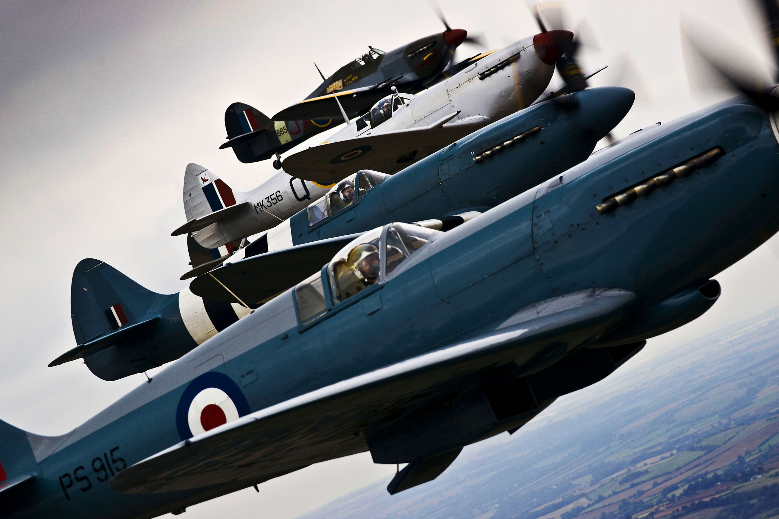 Battle of Britain Memorial Flight Spitfires and Hurricanes flying over Lincolnshire