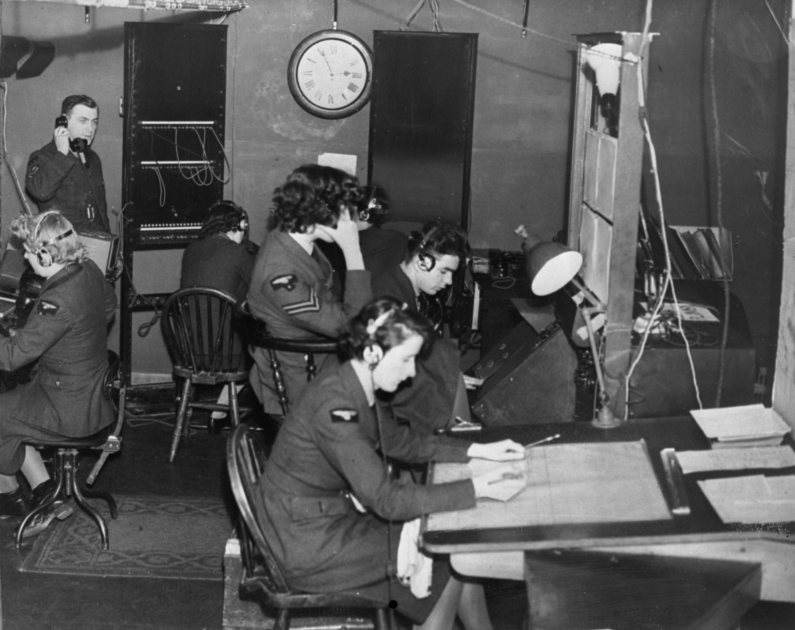 Chain Home receiver hut at Ventnor, with RAF and WAAF radar operators at work during the Battle of Britain. IWM C 1868.