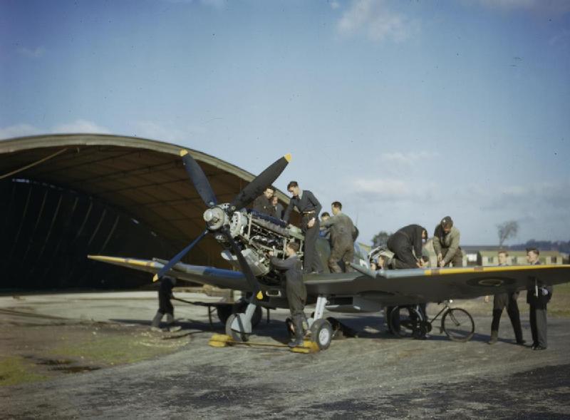 Ground crew working on a Spitfire Mk IX engine at RAF Fairlop in November 1942